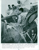 The astronauts John W. Young and Michael Collins were assisted by drawings in the control of Gemini 10 - Vintage Photograph