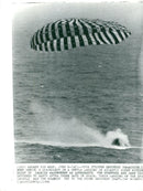 Gemini 9 lands with parachuting in the Atlantic Ocean. The photo taken from USS Wasp - Vintage Photograph