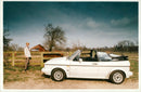 Phillipa Conwelly with her Golf GTi. - Vintage Photograph