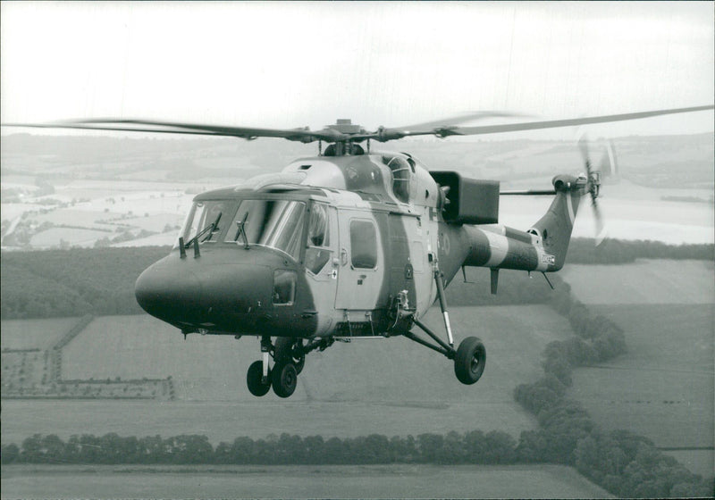 Lynx helicopter:light battled helicopter coming into service in the air. - Vintage Photograph