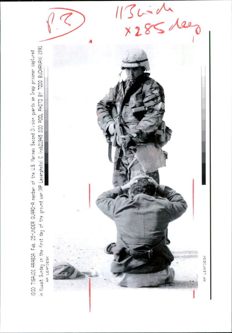Iraq war pow:a u.s marine guard a pow on the first day. - Vintage Photograph
