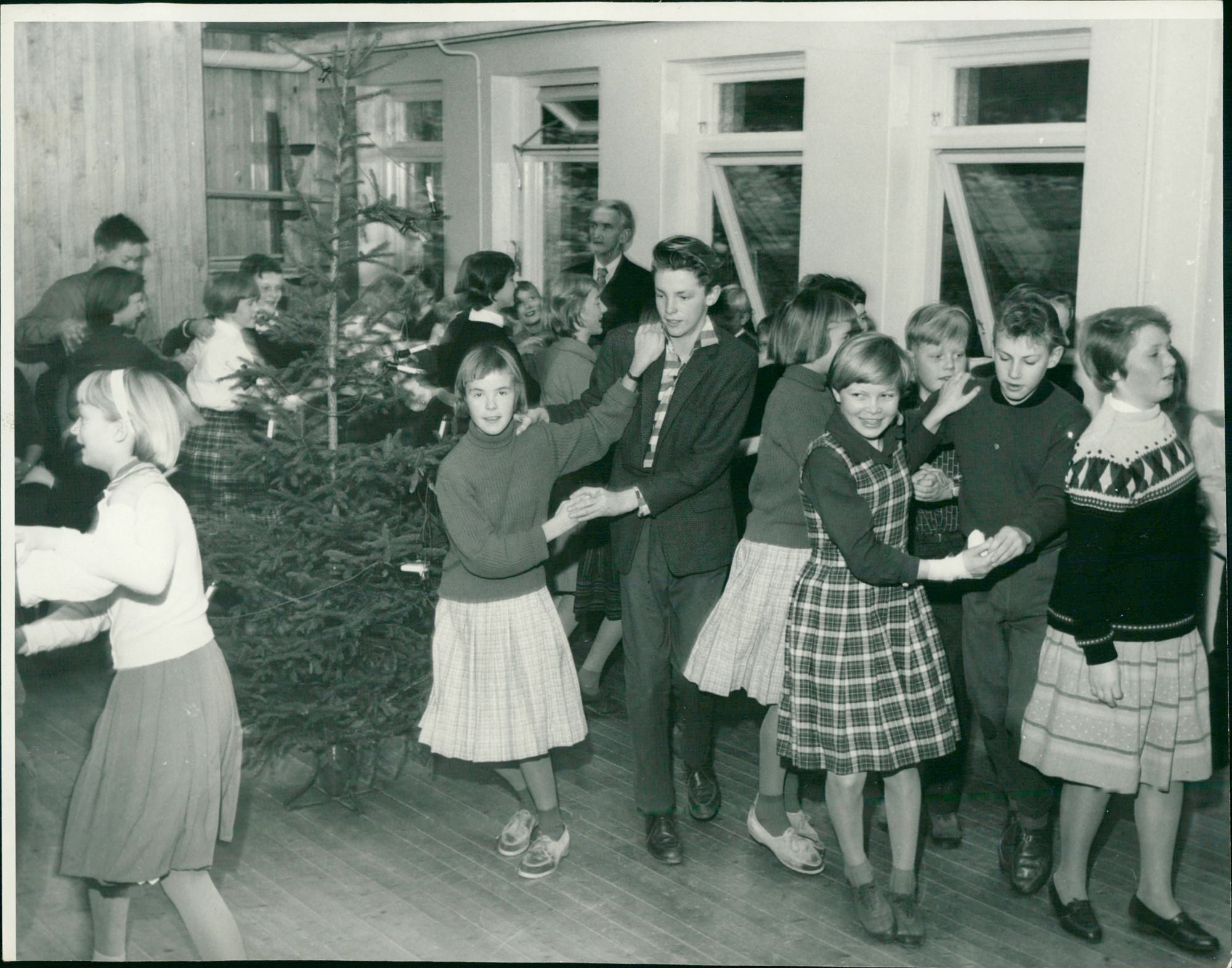 Schoolchildren dancing around the Christmas tree - Vintage Photograph - The Learning Station Dancing Around The Christmas Tree