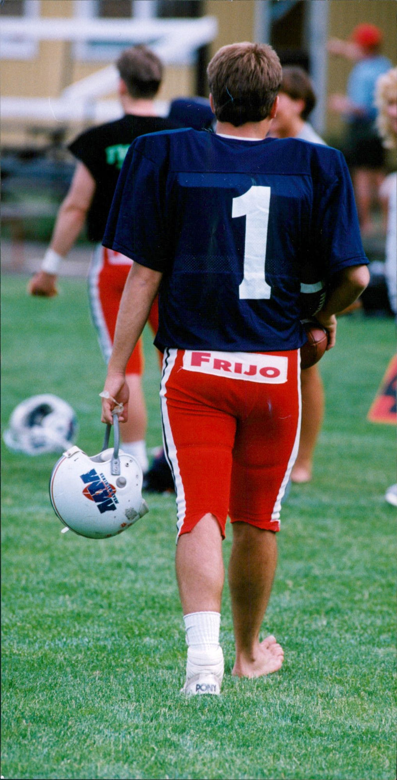 American Football - Lars Bönnelyches kicks without a shoe. - Vintage Photograph