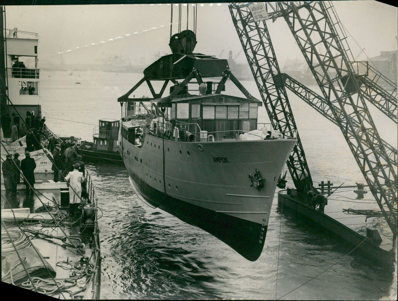 Ship "Ampok" being offloaded from the dock - Vintage Photograph