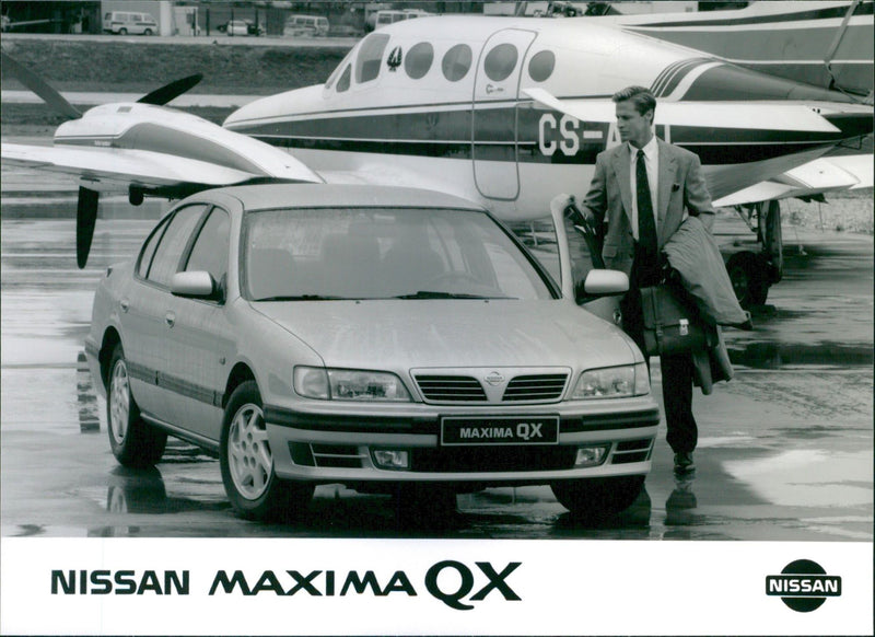 Nissan Maxima QX. - Vintage Photograph