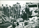 Tunisian officials inspect the rubble in the town of Sakiet - Vintage Photograph