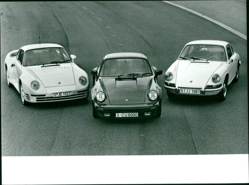 Porsche 911 2.0 Coupé 1965, 911 Turbo 3.0 Coupé 1975 and 959 Coupé 1988 - Vintage Photograph