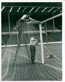 1966 - YOUNG PERCY WEMBLEY GROUNDSMAN SETTING FRES THE, LONDON, - Vintage Photograph