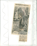 Mrs Ursula Bowen, a biology lecturer from Spencer Churchill College, demonstrates pond specimen collection at the opening of a new nature reserve in Headington on Saturday. - Vintage Photograph