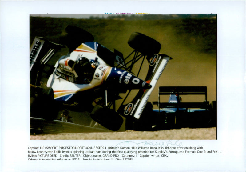 Damon Hill's Williams-Renault is airborne after crashing with Eddie Irvine's Jordan-Hart during the Portuguese Formula One Grand Prix qualifying practice. - Vintage Photograph