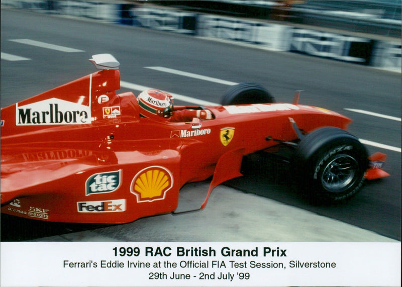 Ferrari driver Eddie Irvine at the 1999 British Grand Prix official test session. - Vintage Photograph