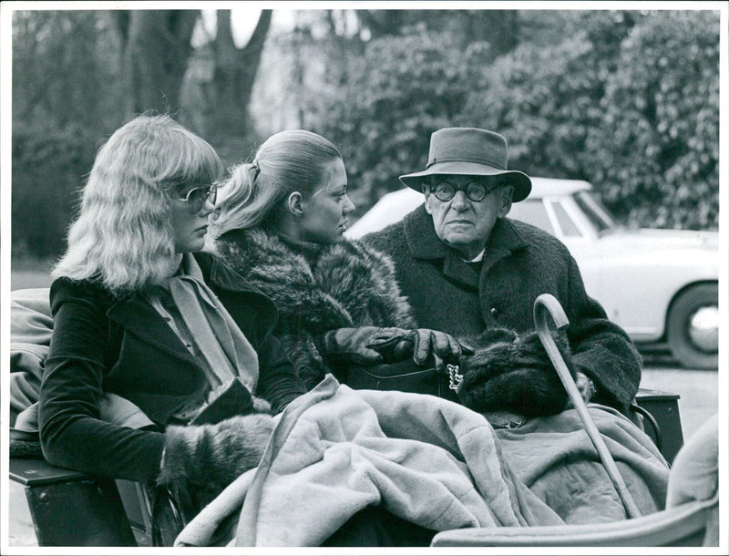 On April 6, 1975, Countess Bonacossa of Italy and Anna Wachtmeister of Sweden join Prince Otto von Bismarck on a hunting expedition in Germany. - Vintage Photograph