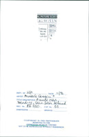 A man stands in front of a landscape painting in the Ashmolean Museum. - Vintage Photograph