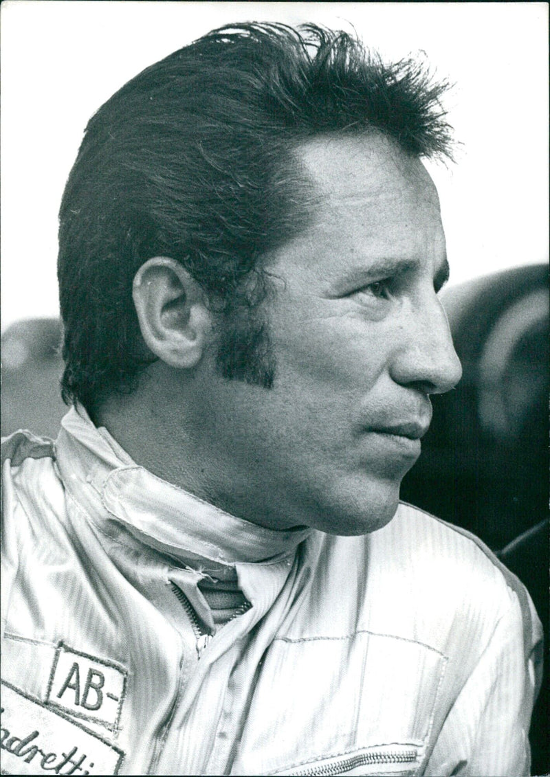 Mario Andretti, a 31-year-old Italian-American racing driver, is part of the official Ferrari racing team alongside Jacky Ickx and Clay Regazzoni. - Vintage Photograph