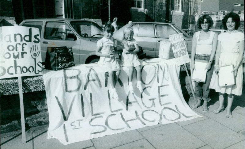 Julie Bedford and Julie Thomas collect signatures for the Barton Village First School petition. - Vintage Photograph