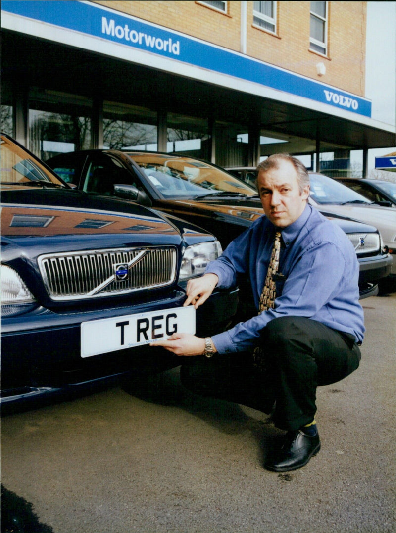 Richard Shepherd, general manager of Motorworld Volvo, stands in front of a T REG Volvo in Botley Road. - Vintage Photograph