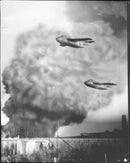 Dive-bombing Flying Barrels in the military exercise. - Vintage Photograph