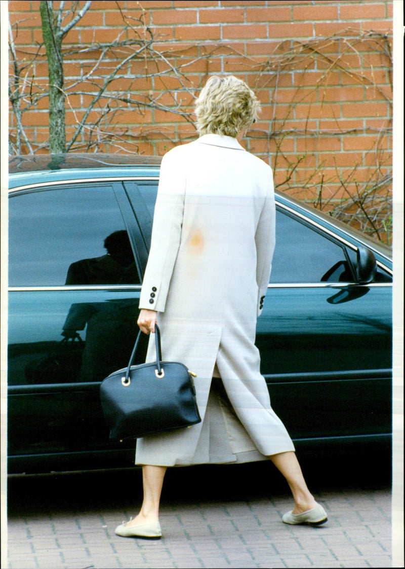 Princess Diana hiding from the paparazzi were - Vintage Photograph