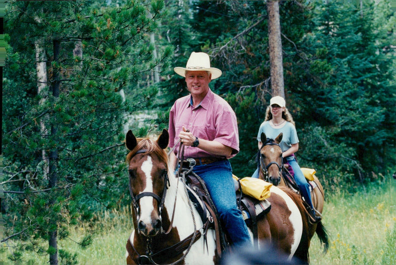 Bill Clinton takes a ride with daughter Chelsea - Vintage Photograph
