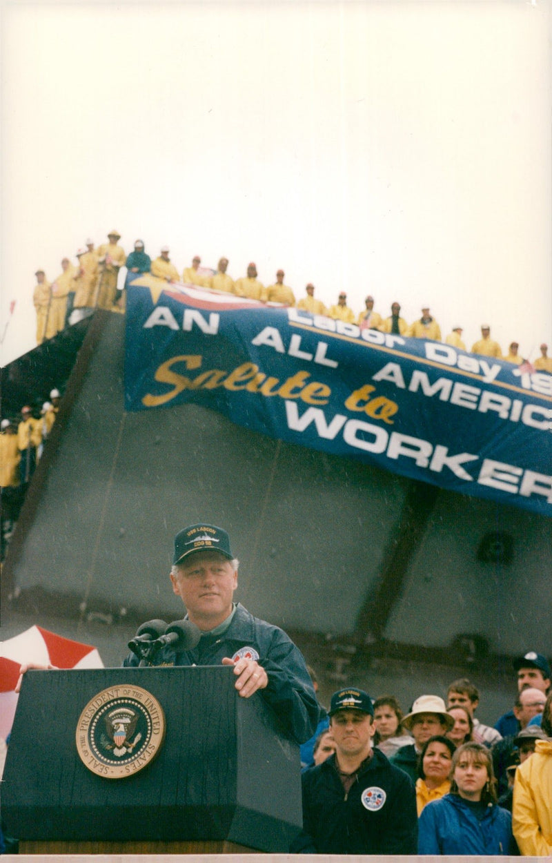 President Bill Clinton speaks at the Bath Iron Works shipyard - Vintage Photograph