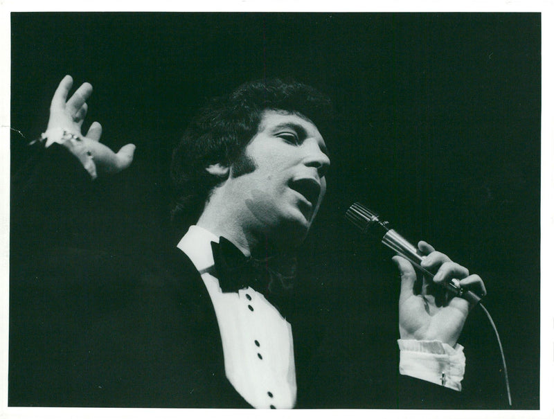 Portrait image of Tom Jones taken in conjunction with the concert at the Concert Hall. - Vintage Photograph