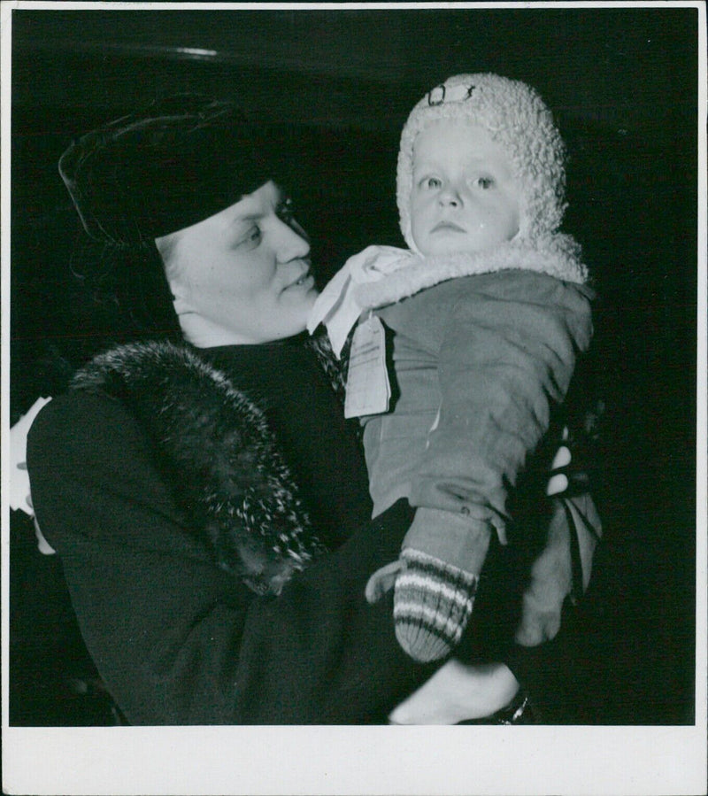 Finlance children in Stockholm, Sweden pose in front of the camera in March 1942. - Vintage Photograph