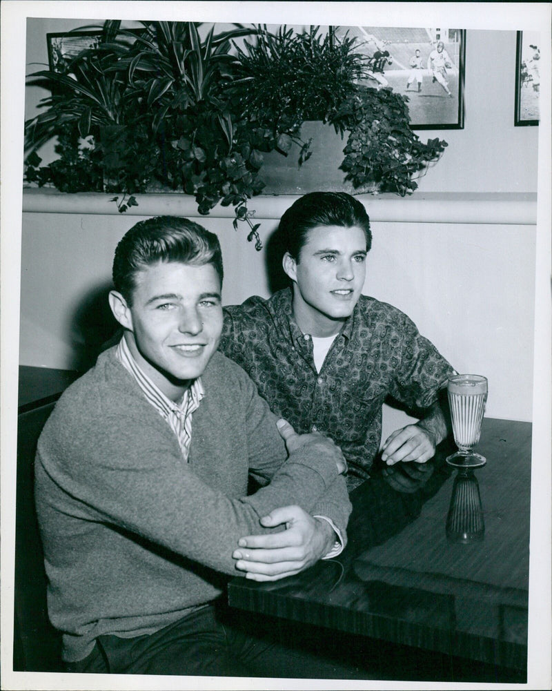 Singer Dave Welson and his brother Rick Welson pose for a photo in Stockholm, Sweden. - Vintage Photograph