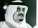 Crown Prince Fahad ibn Abdul Aziz of Saudi Arabia, brother of King Khaled, stands in front of a crowd in 1981. - Vintage Photograph