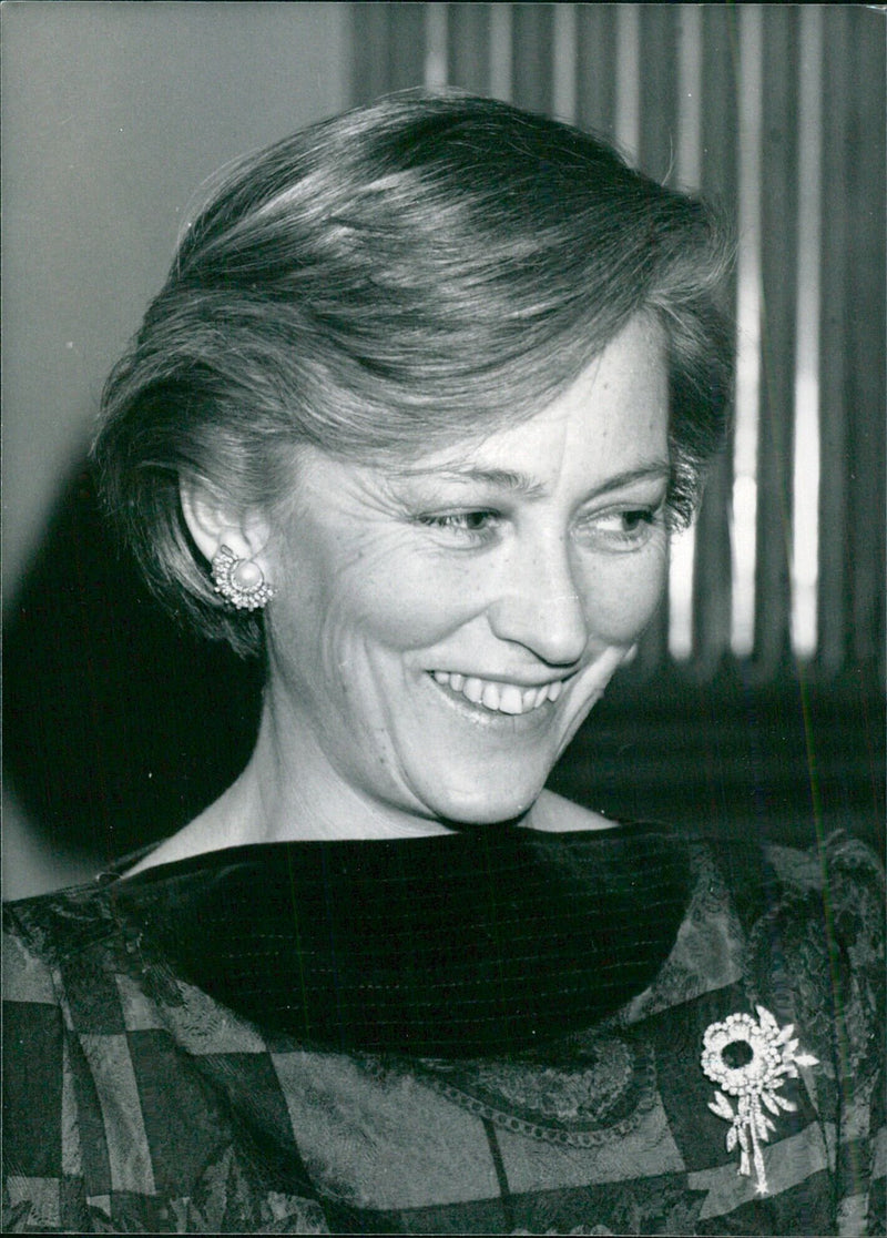 Princess Paola of Belgium smiles for the camera during a visit to AGOS Hunge in Belgium. - Vintage Photograph