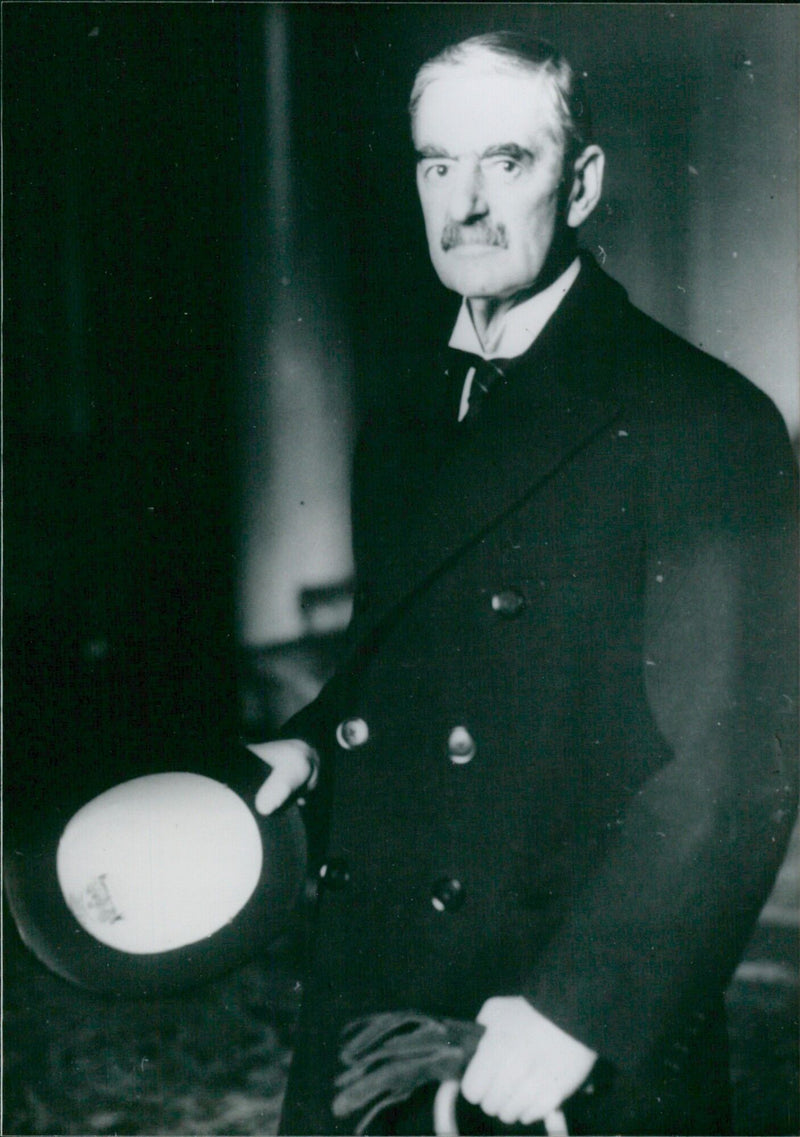 British Prime Minister Neville Chamberlain pictured in number 10 Downing Street before departing to meet with Adolph Hitler in September 1938. - Vintage Photograph