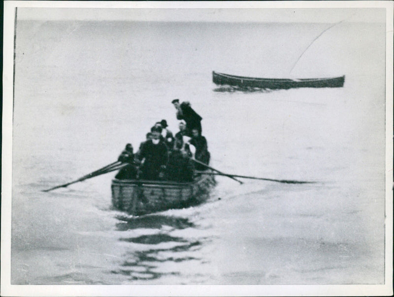 Survivors of the Skeppsbrutna disaster are rescued from the icy waters of the Baltic Sea by the Simon Bolivar lifeboat on November 31, 1939, during the Nazis' war on anything afloat. - Vintage Photograph