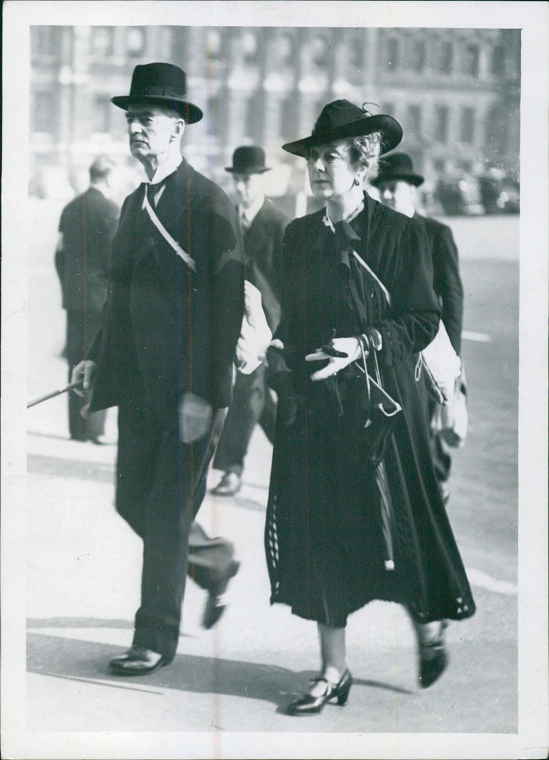 Mr. and Mrs. Neville Chamberlain on a morning walk in London, 1940 - Vintage Photograph