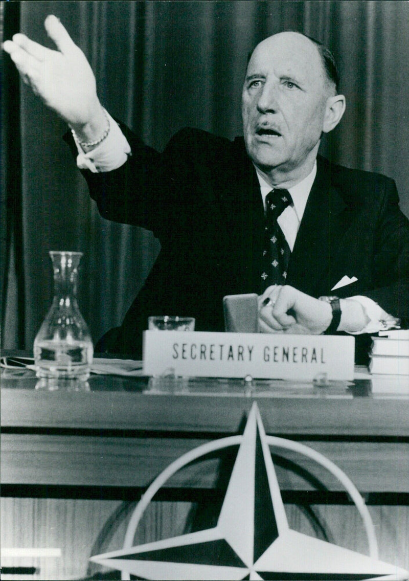 Dr. Joseph Luns speaking at a press conference in Brussels - Vintage Photograph