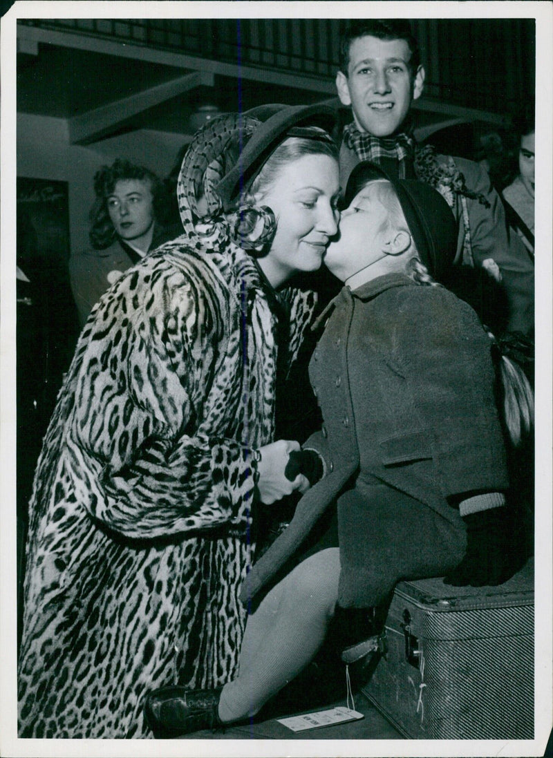 Anna-Lisa Björling receives a farewell kiss from her daughter A n-Charlotte - Vintage Photograph