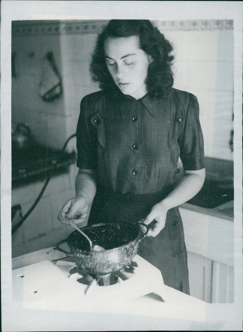 Berliners Turn Steel Helmets into Saucepans - Vintage Photograph