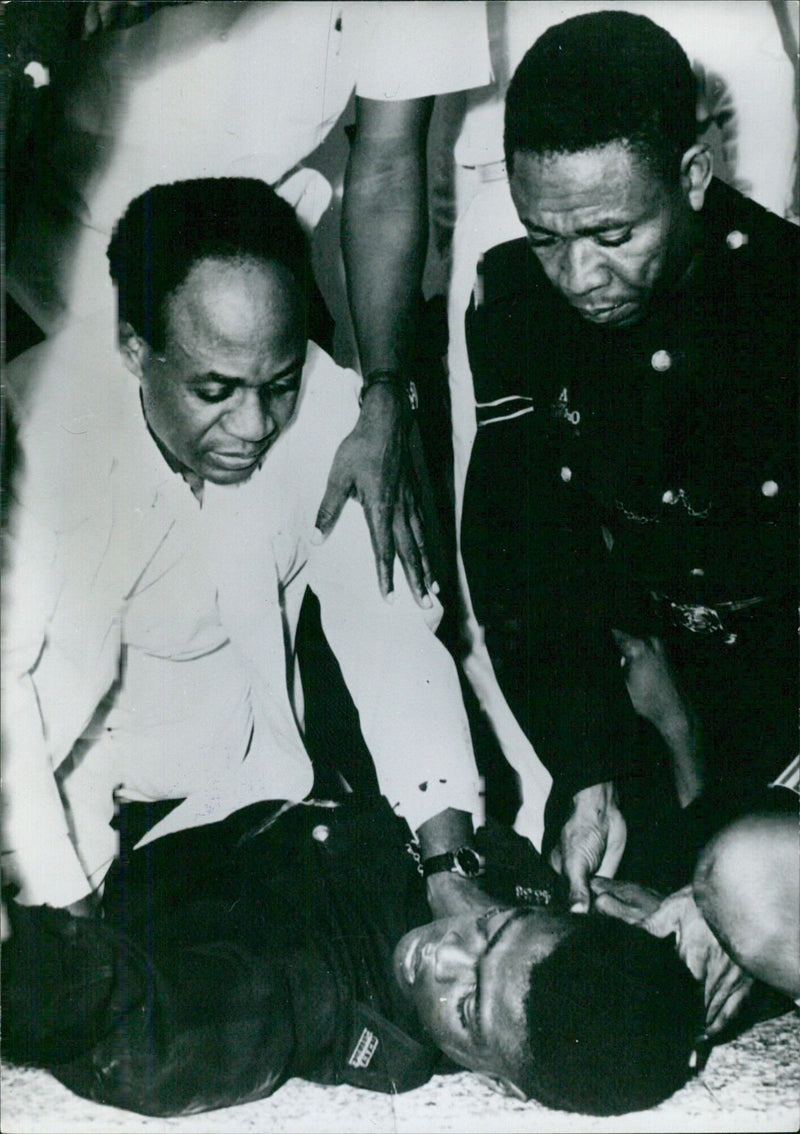 President Nkrumah pressing down the shoulders of Police Constable Ametewee - Vintage Photograph