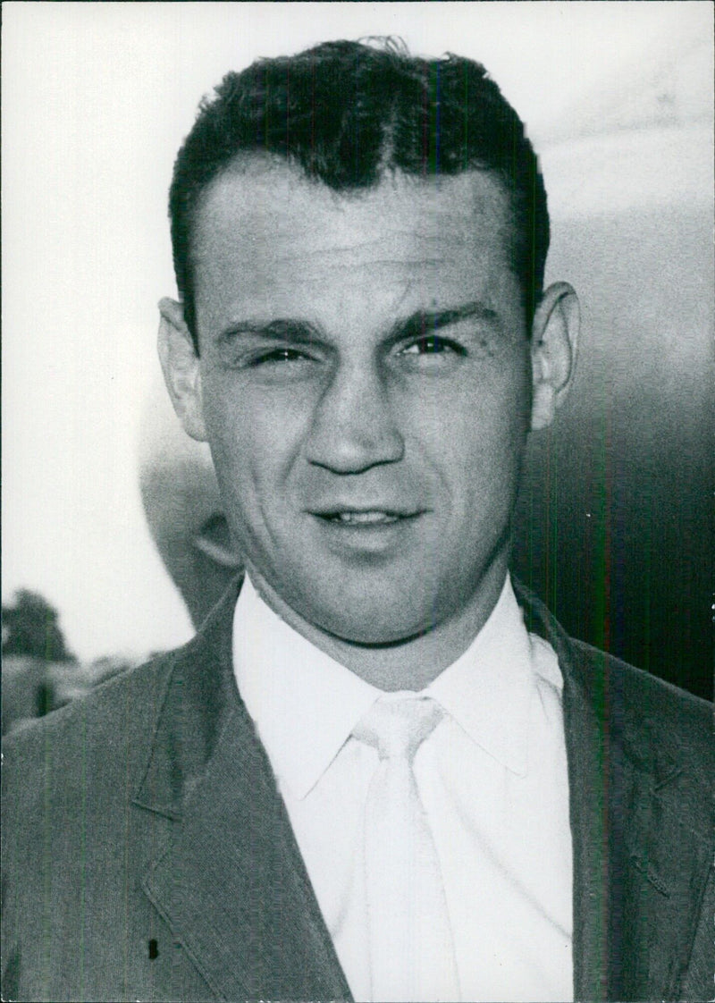 Featured in Gut International Magazine on August 15, 1960, this photo captures American boxer Paul Pender, who held the World Middleweight boxing title, in Stockholm, Sweden. - Vintage Photograph