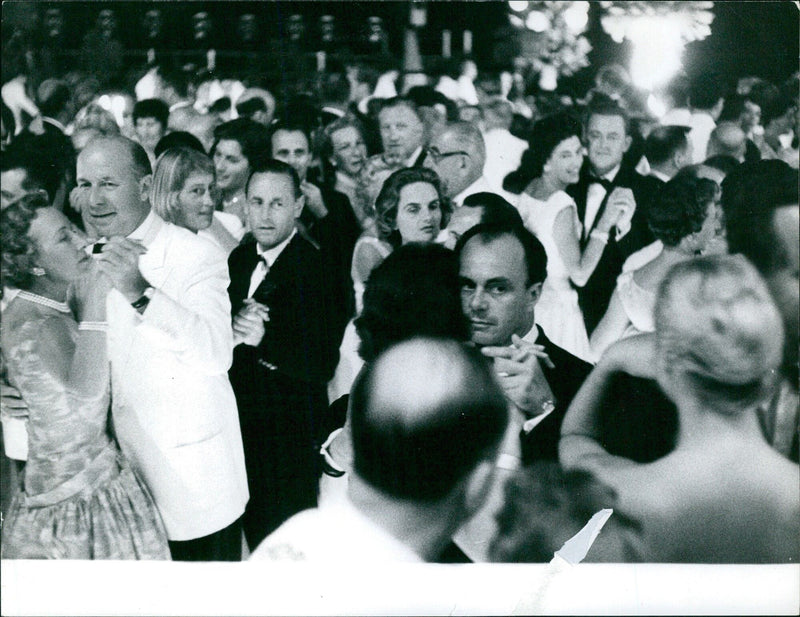 Ali Khan and Bettina dance at Grace and Rainer's first official reception. - Vintage Photograph