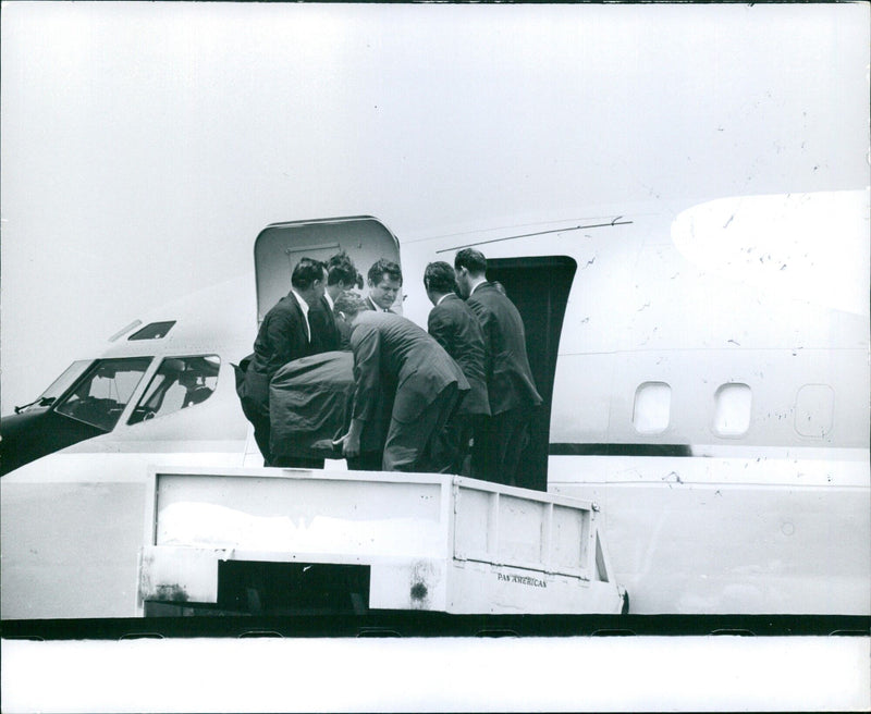 PAN AMERICAN men lifting coffin onto airplane at Los Angeles - Vintage Photograph