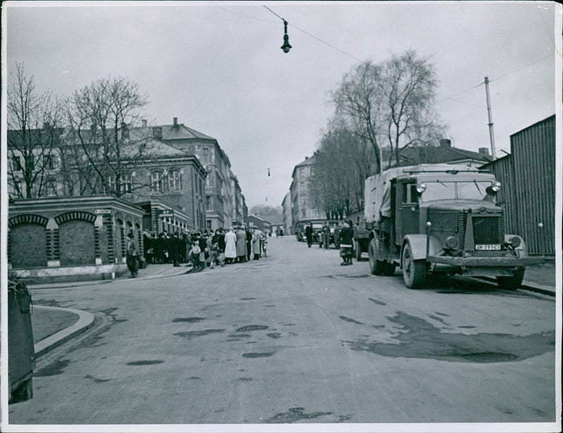 Mobilized workers and officials gather at Grünerlökka school in Oslo, Norway. - Vintage Photograph