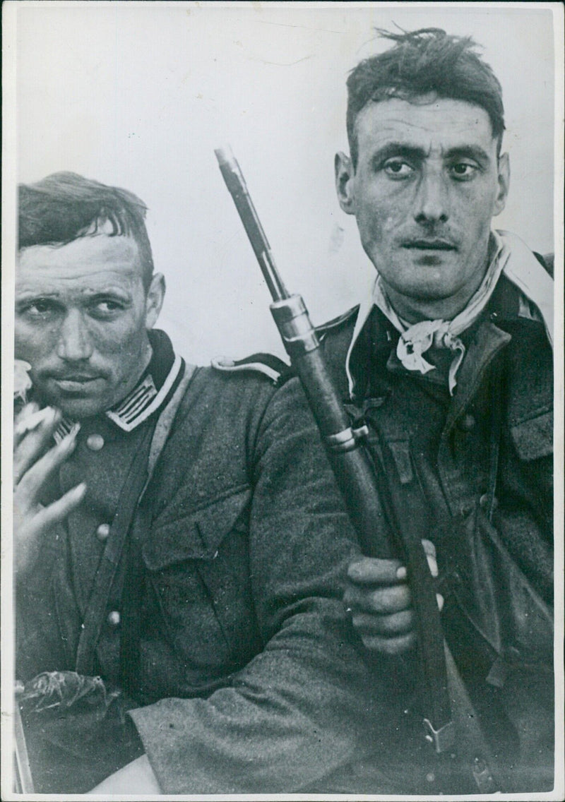 German soldiers take a short break during a march in the East - Vintage Photograph