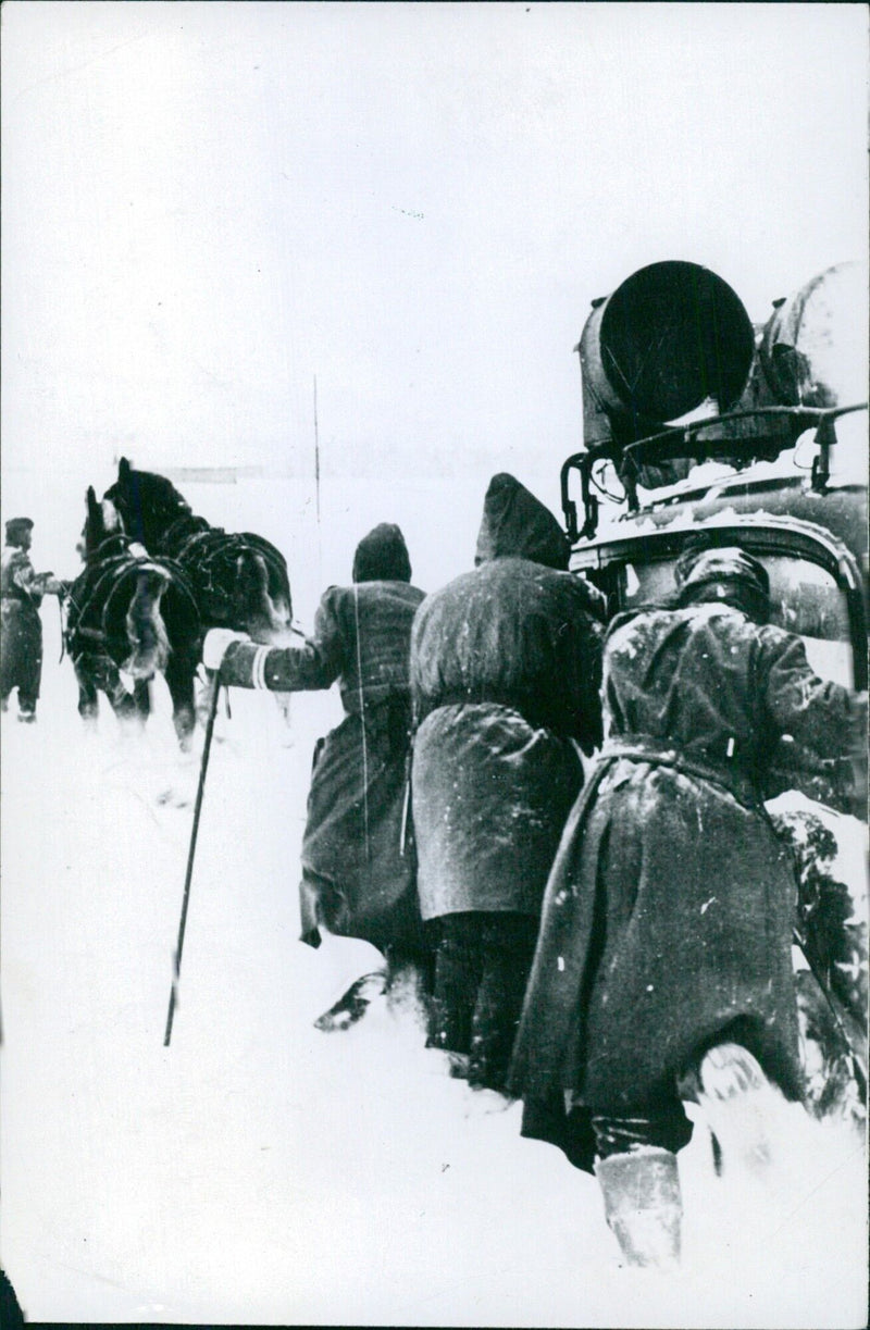 A speaker car from the German "entertainment detail" has gotten stuck in the snow. - Vintage Photograph