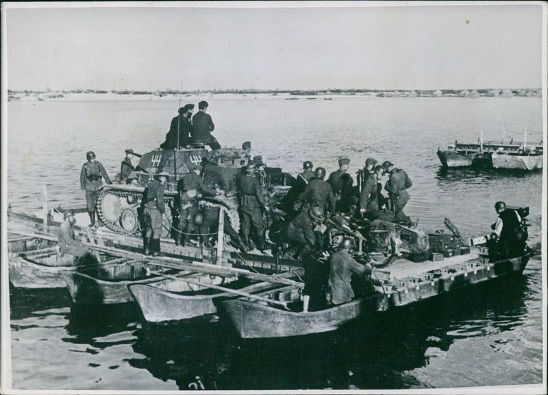 In the East. Image of German troops advancing. - Vintage Photograph