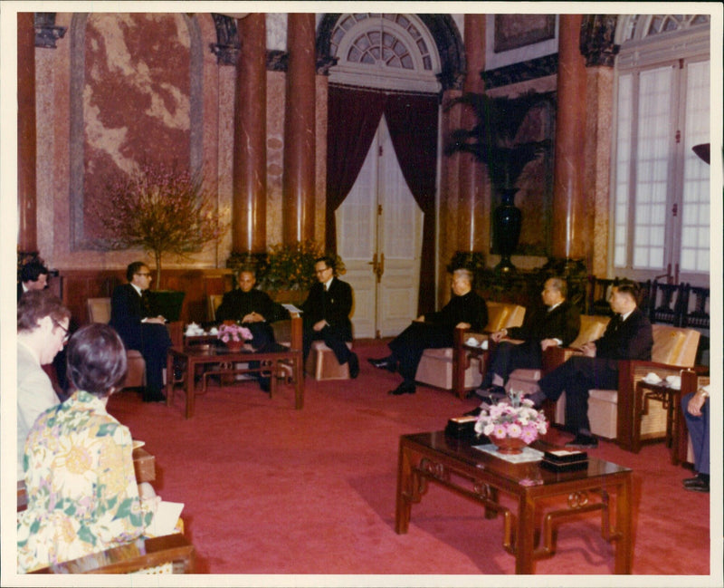 Dr. Henry Kissinger talks to North Vietnamese Prime Minister Pham Van Dong - Vintage Photograph