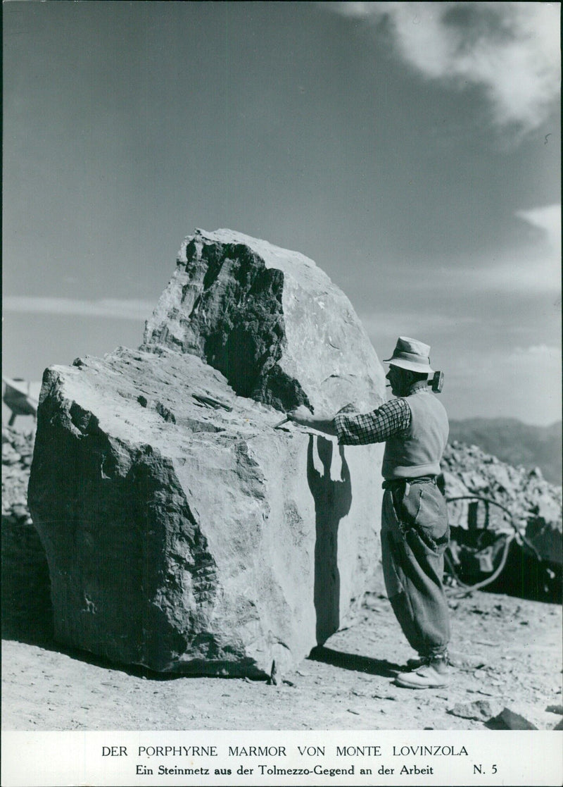 A stonemason working on the porphyry marble of Monte Lovinzola - Vintage Photograph