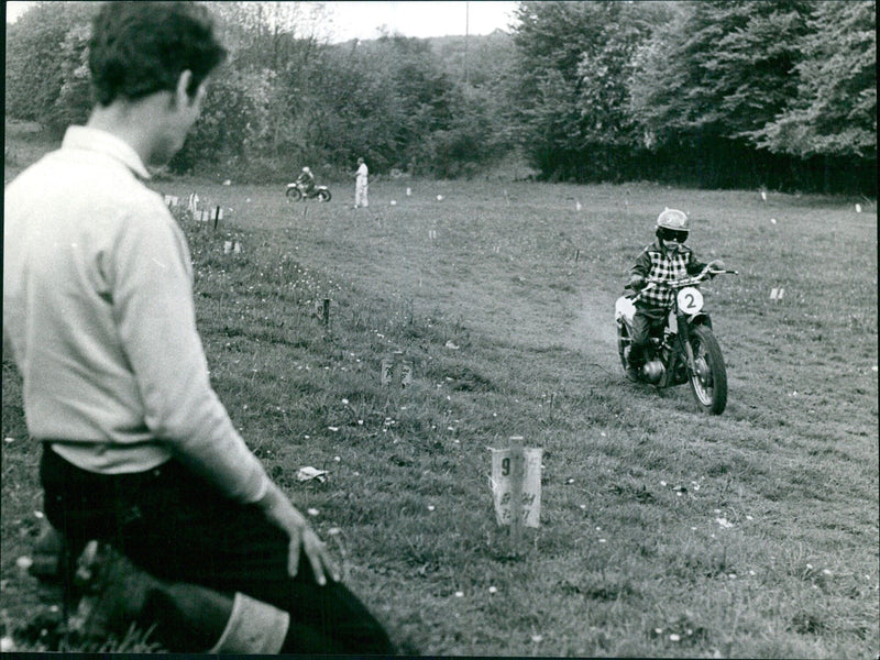 Father watches son race mini scrambler - Vintage Photograph