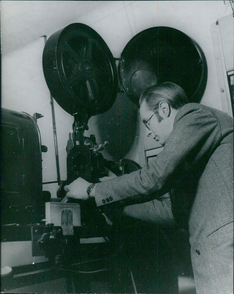 Tuberculosis patient undergoing treatment with an electric machine by electrician John Palmer - Vintage Photograph