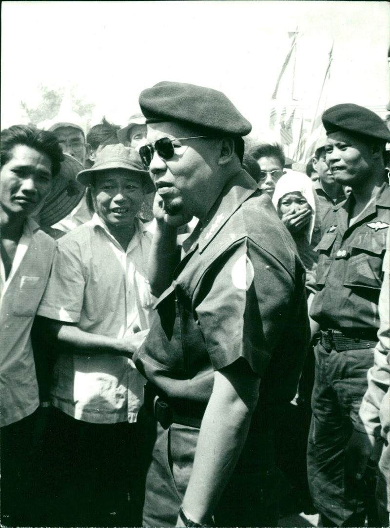 General Nguyen Khanh, Prime Minister of South Vietnam, conversing with civilian supporters - Vintage Photograph