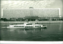 Russian riverboat passing Hotel Rossiya in Moscow - Vintage Photograph