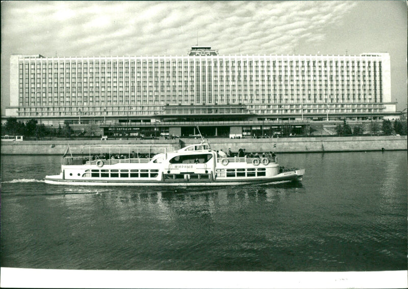 Russian riverboat passing Hotel Rossiya in Moscow - Vintage Photograph